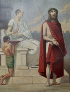 Ein Gemälde zeigt Jesus, der eine Dornenkrone und ein rotes Gewand trägt und ein Schilfrohr hält. Er steht vor einem sitzenden Mann in weißem Gewand, wahrscheinlich Pontius Pilatus, während ein Junge neben ihnen eine Schüssel zum Händewaschen hält. (Text mit KI erstellt)