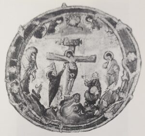 Ein kreisförmiges mittelalterliches Kunstwerk aus dem Jahr 850 n. Chr. zeigt die Kreuzigung Jesu in einer verzierten Initiale O, umgeben von trauernden Figuren und symbolischen Elementen, die die Ecclesia repräsentieren, alles in komplizierten Schwarz-Weiß-Details dargestellt. (Text mit KI erstellt)