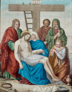 Ein Gemälde zeigt den vom Kreuz abgenommenen Leichnam Jesu, umgeben von trauernden Figuren, darunter Maria und Jünger, mit einer Leiter und dem Zeichen INRI am Kreuz im Hintergrund. Eine Dornenkrone liegt auf dem Boden. (Text mit KI erstellt)