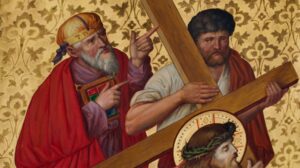 Ein bärtiger Mann in roter Robe zeigt auf einen anderen Mann, der ein großes Holzkreuz trägt. Der Hintergrund ist goldfarben und mit einem Blumenmuster verziert. Unten ist teilweise eine dritte Figur mit Heiligenschein und Dornenkrone zu sehen. (Text mit KI erstellt)